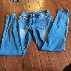 Blue mid rise skinny jeans